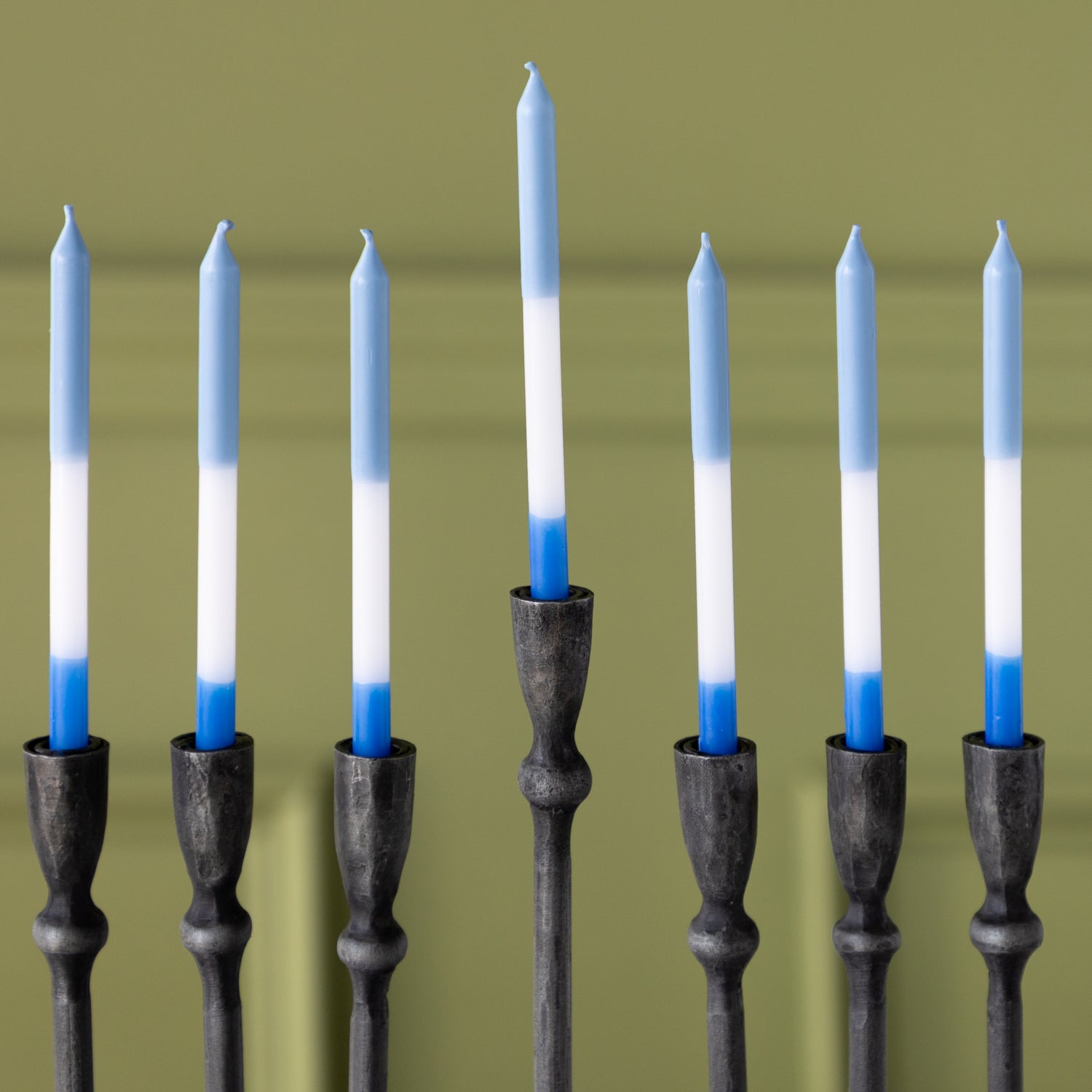 Liora Menorah with blue and white menorah candles.