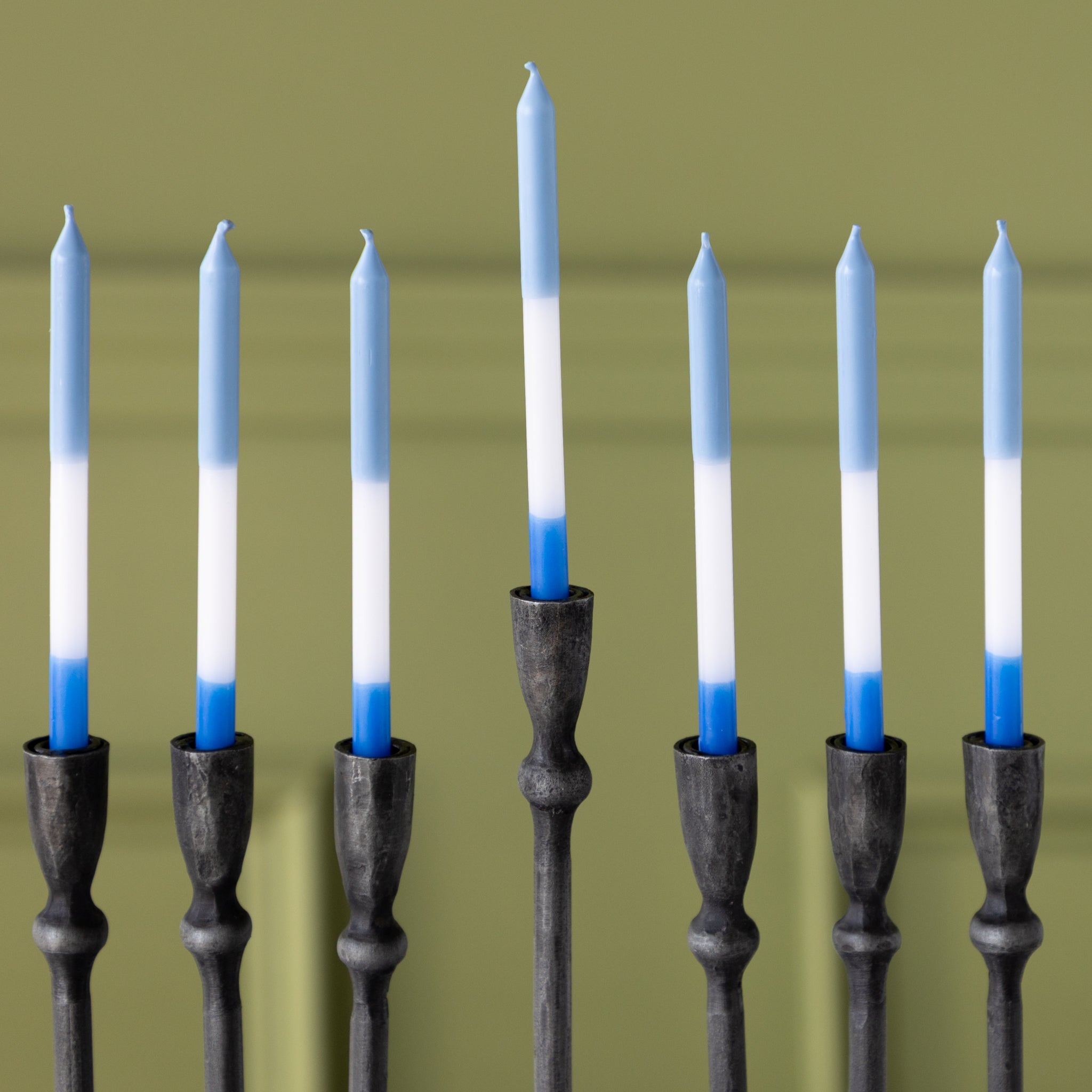 Liora Menorah with blue and white menorah candles.
