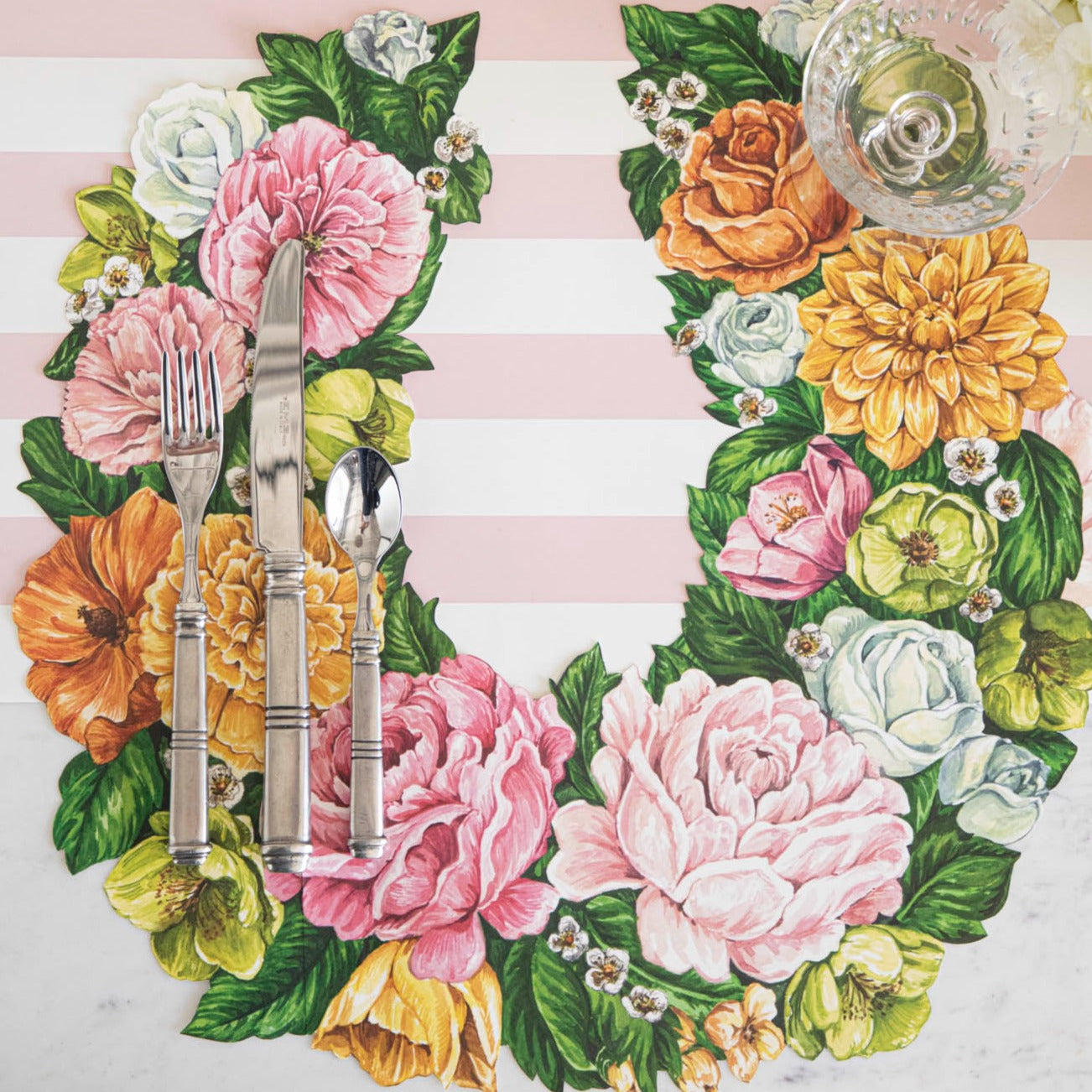 Hester &amp; Cook Die-cut Derby Wreath Placemat with flowers on it.