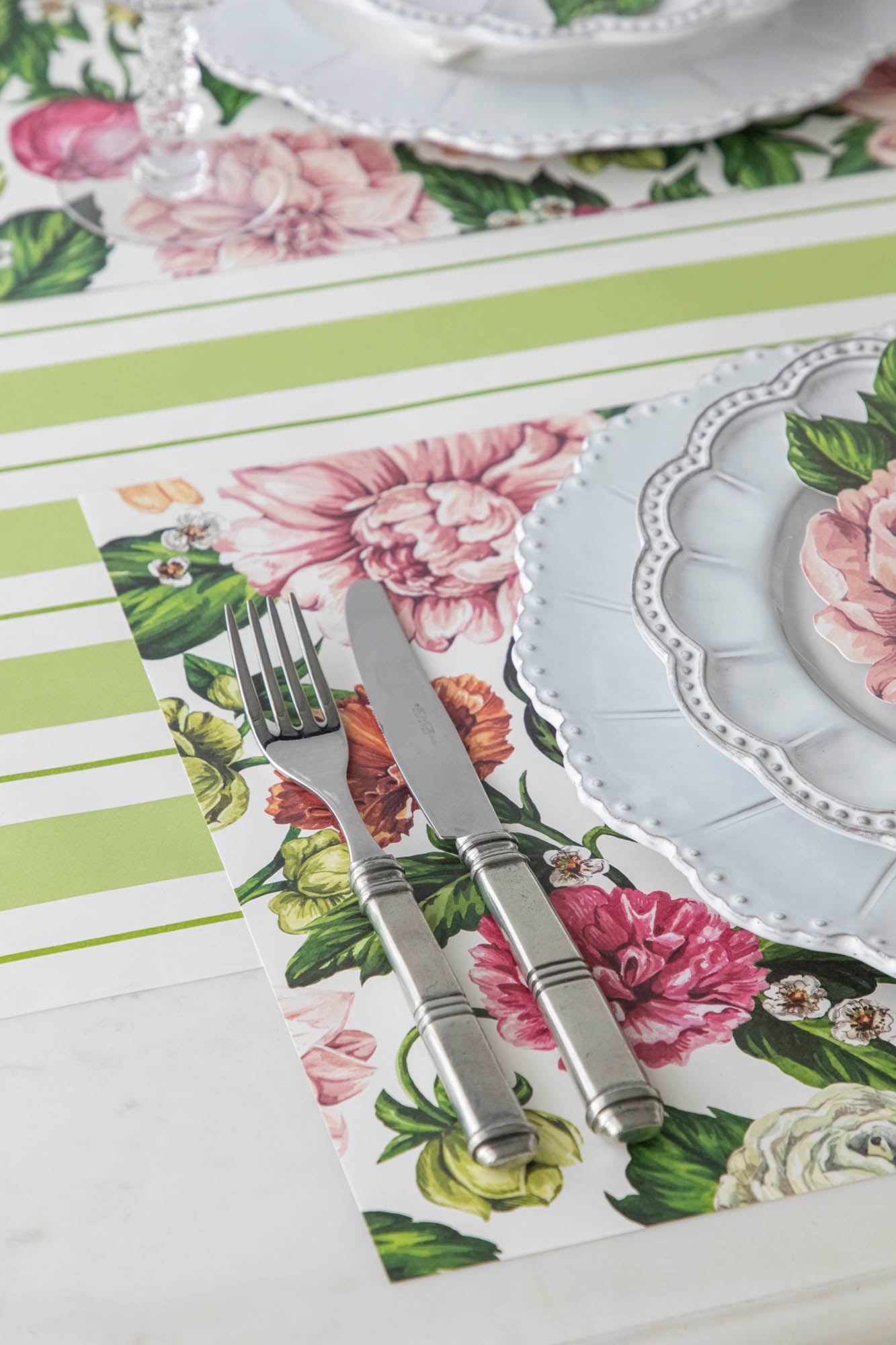 Close-up of the Garden Cascade Placemat under an elegant place setting.