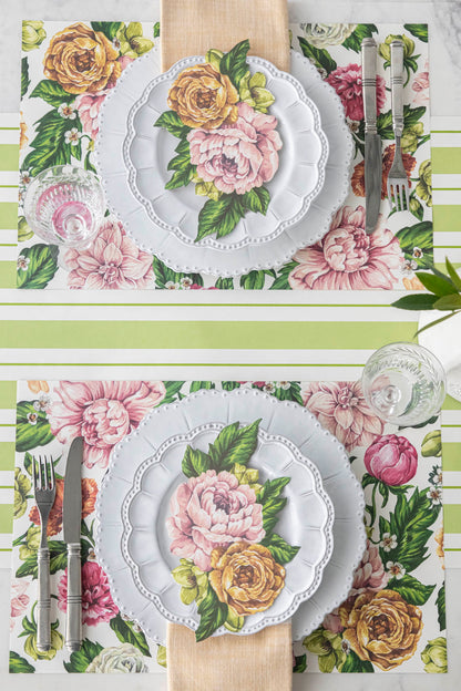 The Garden Cascade Placemat under an elegant table setting for two, from above.