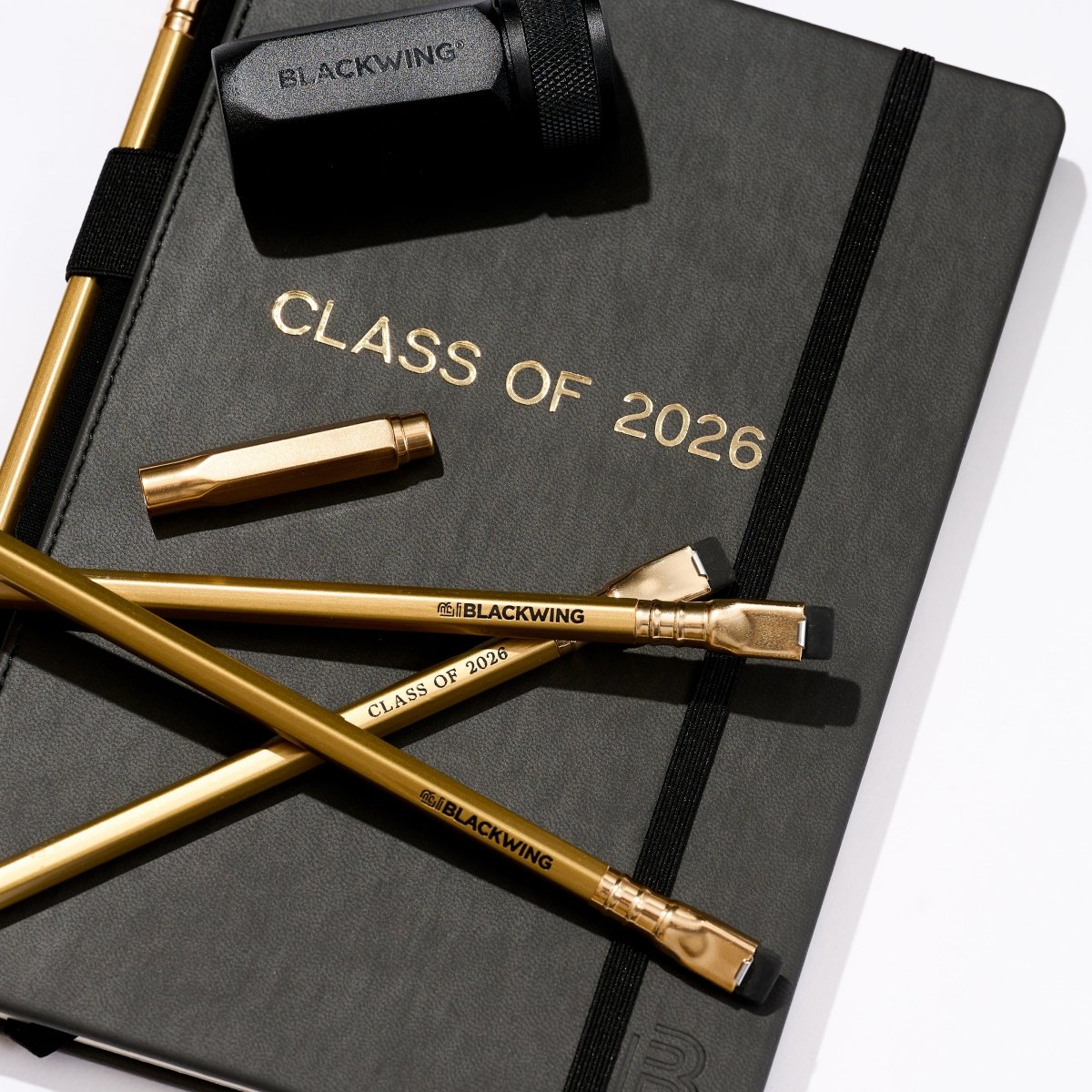 Black notebook with &