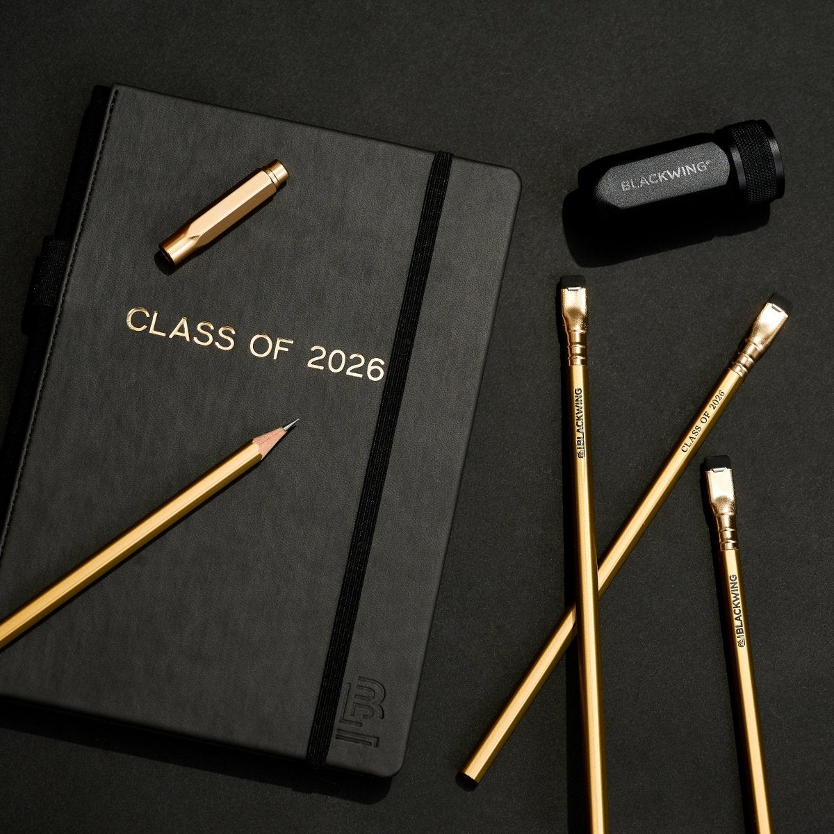 Black notebook with &
