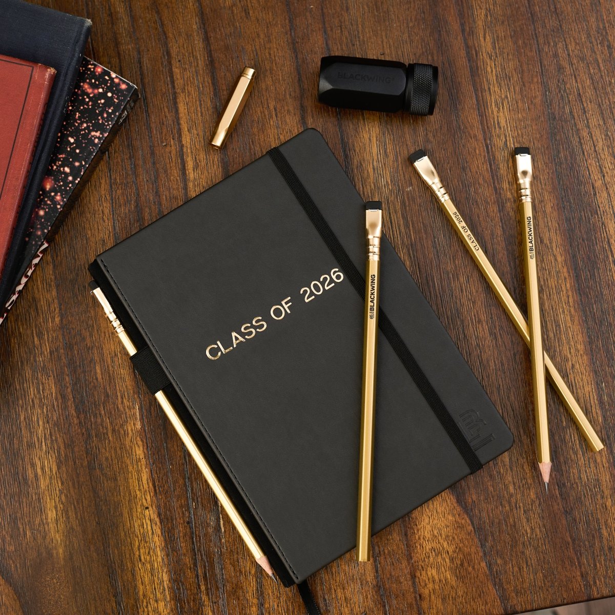 Black notebook with &