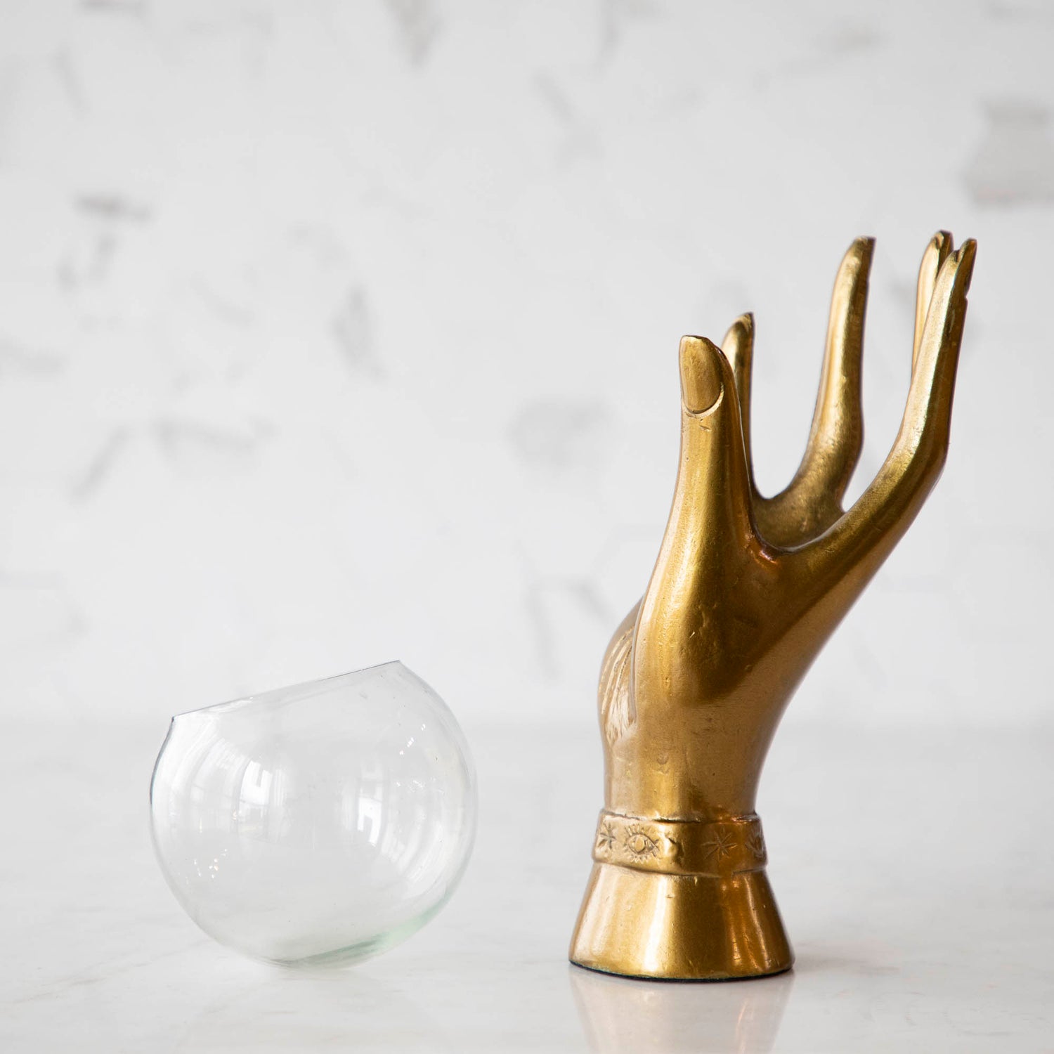 Metal 5.0&quot; x 4.0&quot; x 10.5&quot;, hand-shaped terranium with a glass globe next to it.