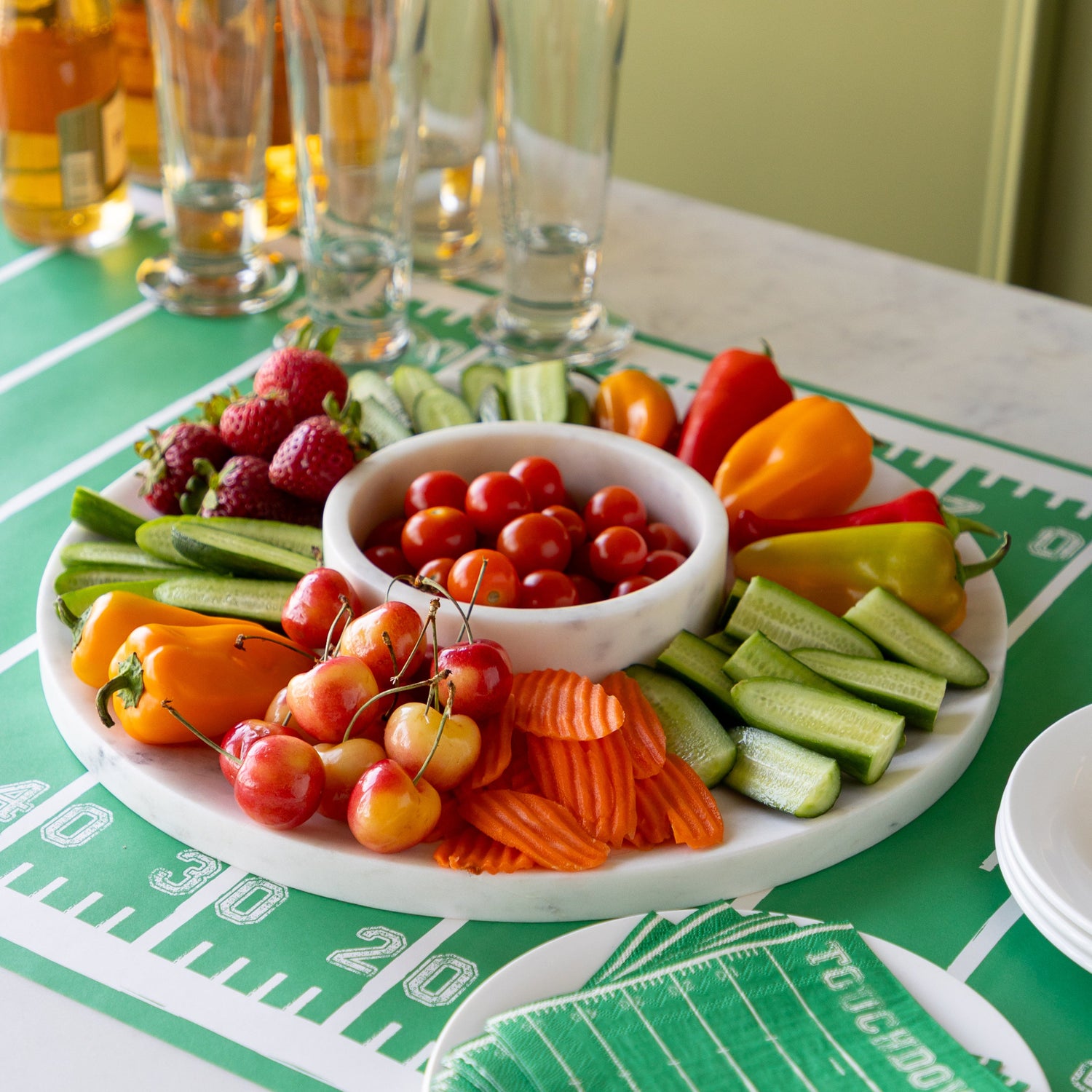 Marble Chip and Dip Server with fruits and veggies atop on the Touchdown Runner.