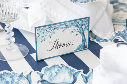 An Indigo Meadow place card on a table, made by Hester &amp; Cook.