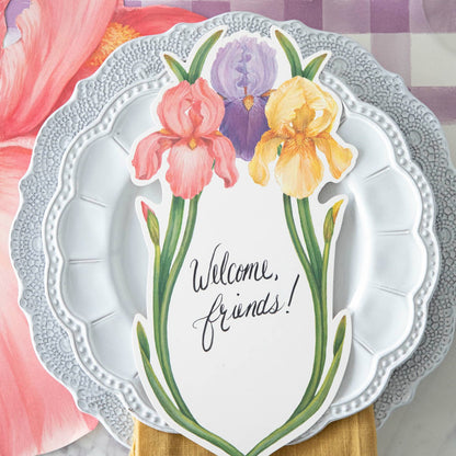 A handmade tablescape showcasing a Die-cut Iris Placemat adorned with delicate Bearded Iris flowers by Hester &amp; Cook.