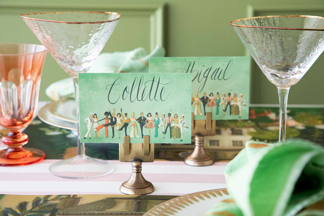 An elegant tablescape featuring High Kick Place Cards at each place setting.