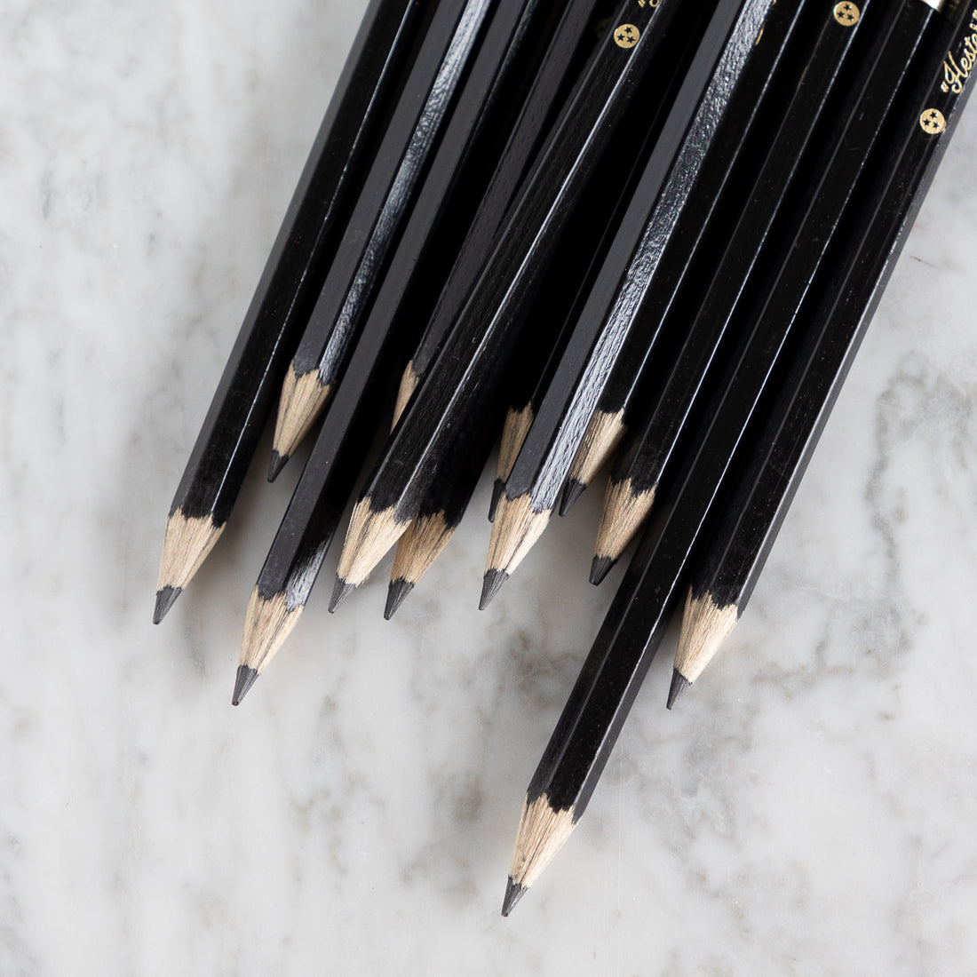 Close up of the sharpened ends of Black Jumbo Hex Pencils.