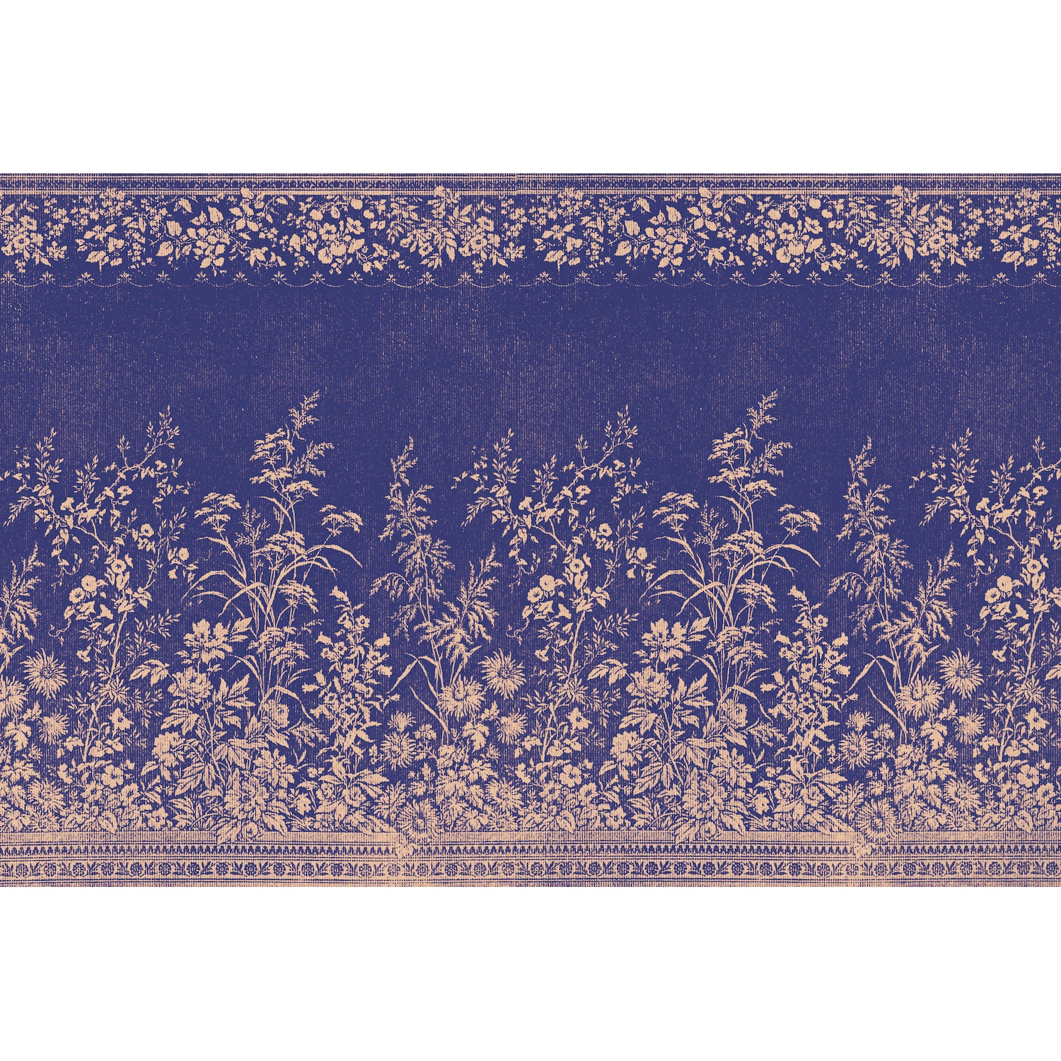 A Navy Woven Floral Placemat from Hester &amp; Cook with a blue and gold floral pattern on a fabric-inspired print tablecloth.