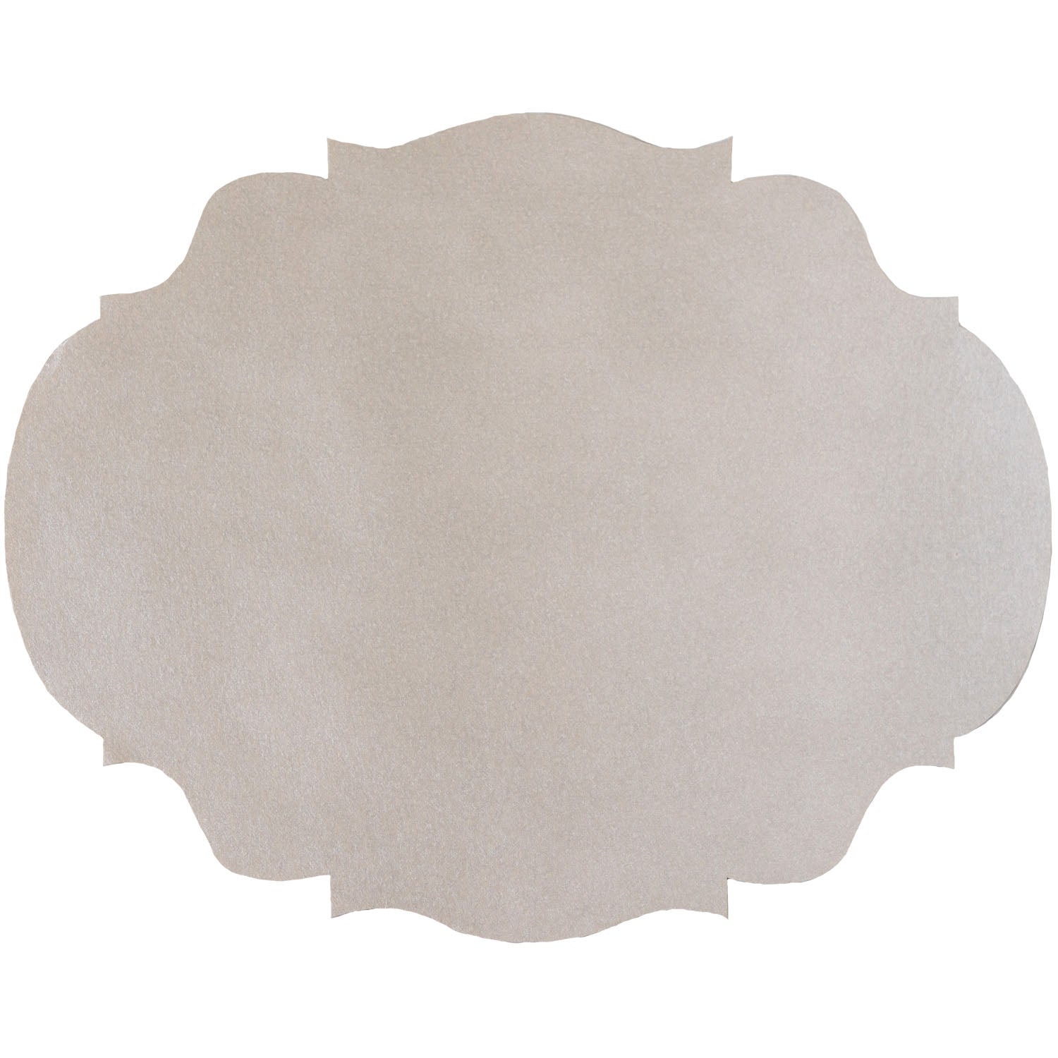 A silver scalloped-edge paper placemat with an intricate, symmetrical shape.