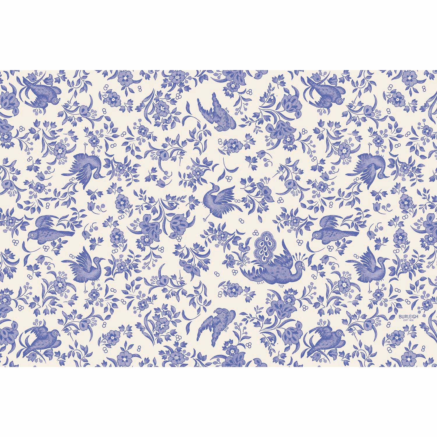 A Blue Regal Peacock Paper Placemat from Hester &amp; Cook, featuring a blue bird and floral pattern on a white background, inspired by the ornamental bird pattern from Burleigh.