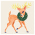 A square cocktail napkin featuring a cute, vintage illustration of a reindeer prancing with a green wreath around his neck, on a cream background.
