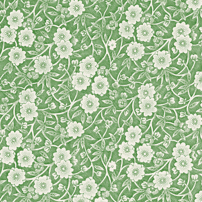 A collection of Green Calico napkins by Hester &amp; Cook, featuring white flowers, ideal for table settings.