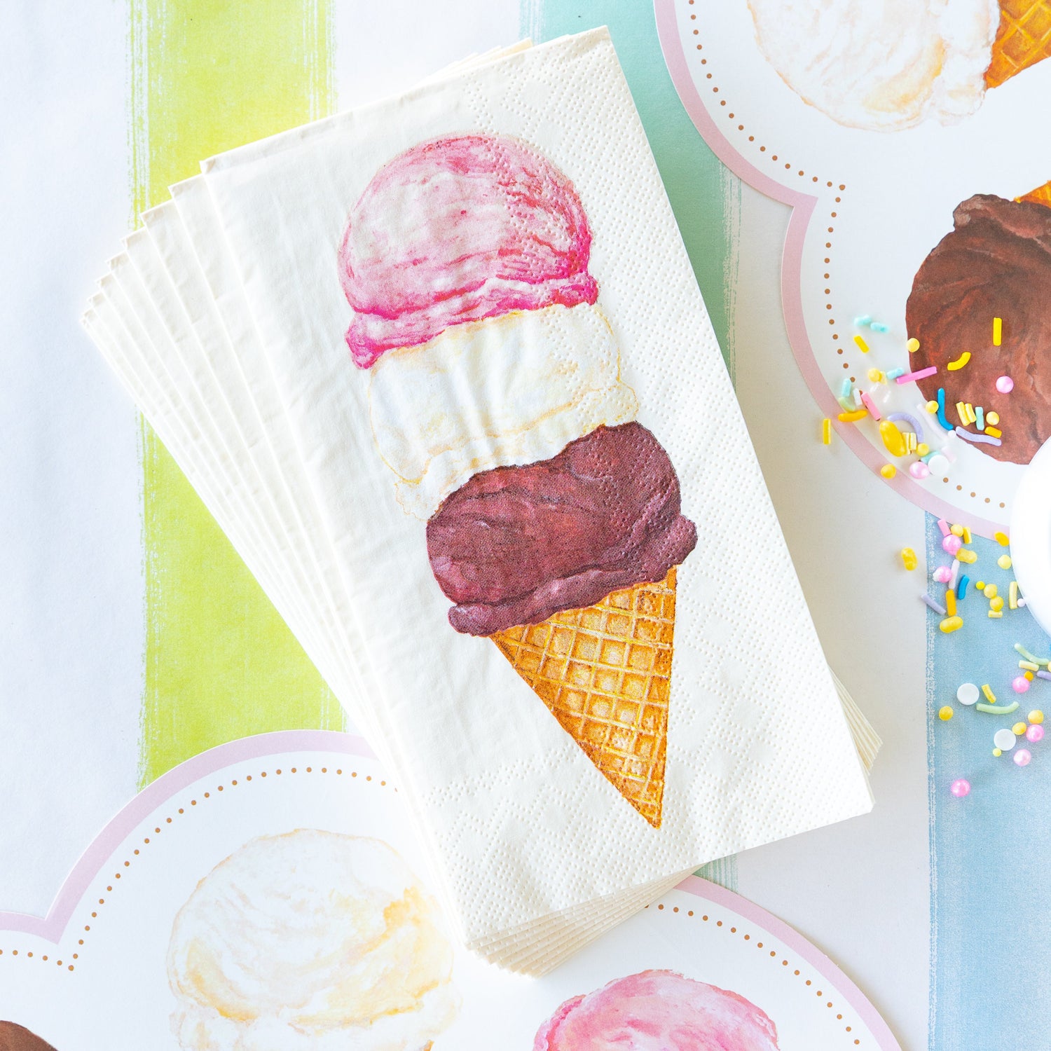 Stack of Ice Cream Guest Napkins on the Sorbet Painted Stripe Runner.