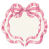 A Hester & Cook Die-cut Pink Bow Placemat on a white background.