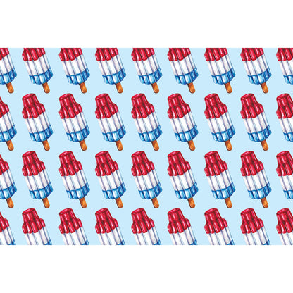 The Rocket Pop Placemat featuring a repeated pattern of rocket pops on a blue background.