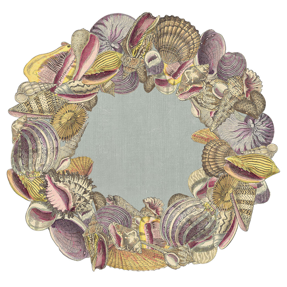 The Die-cut Shell Wreath Placemat featuring swirling nautilus and scalloped clam shells with a blue center.
