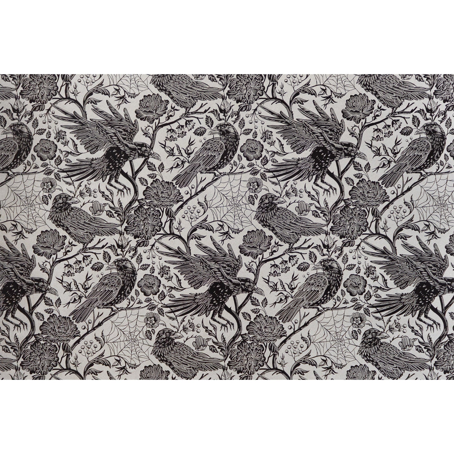 Raven Toile Placemat by Hester &amp; Cook featuring a black toile pattern with metallic silver of Ravens, spiderwebs and flowers on a silver background.