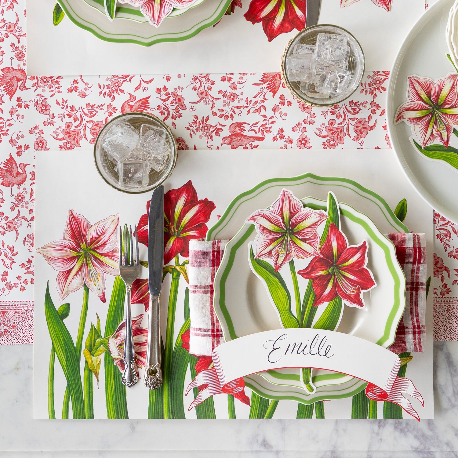 Table setting with Amaryllis Placemat, Green Icing on the Cake Dinnerware and Classic Red Banner Table Accent on the Red Regal Peacock Runner.