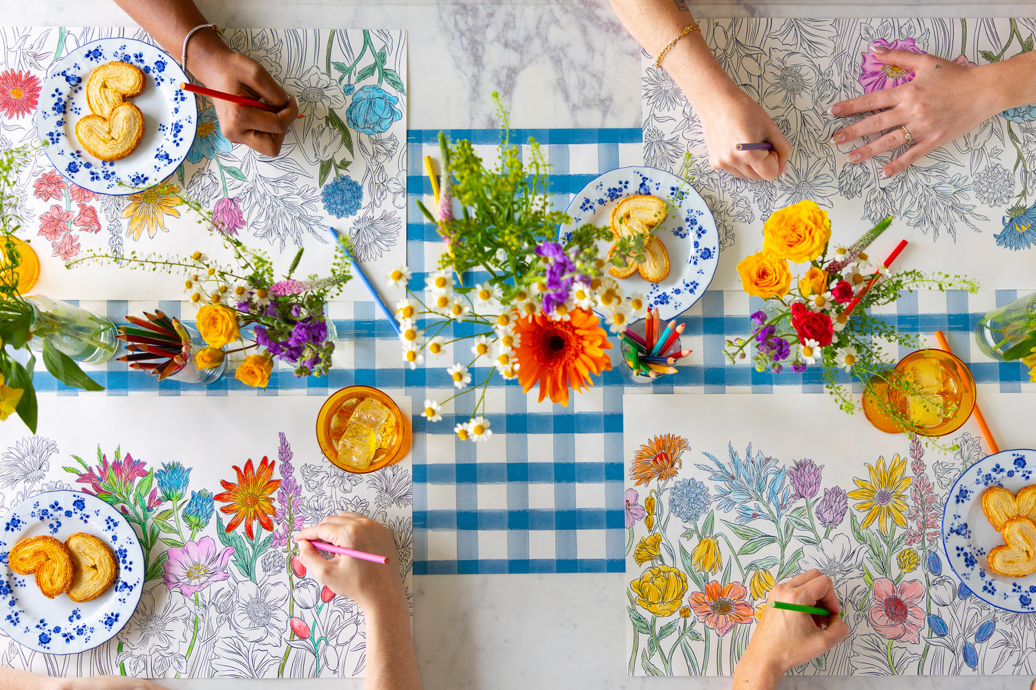 People coloring on the Coloring Wildflower Meadow Placemat.