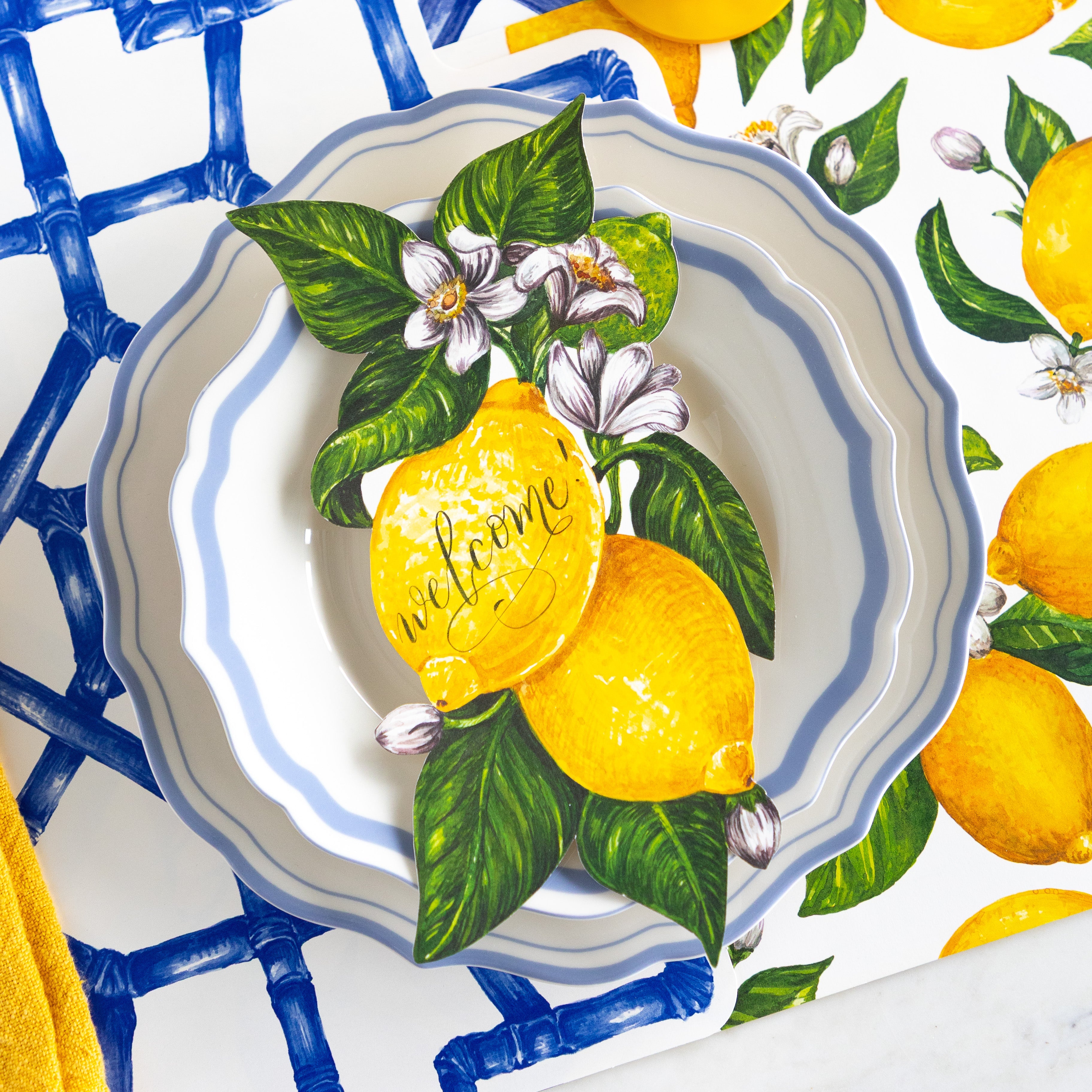 Place setting with the Lemons Table Accent on the Cornflower Blue Icing on the Cake Plates.