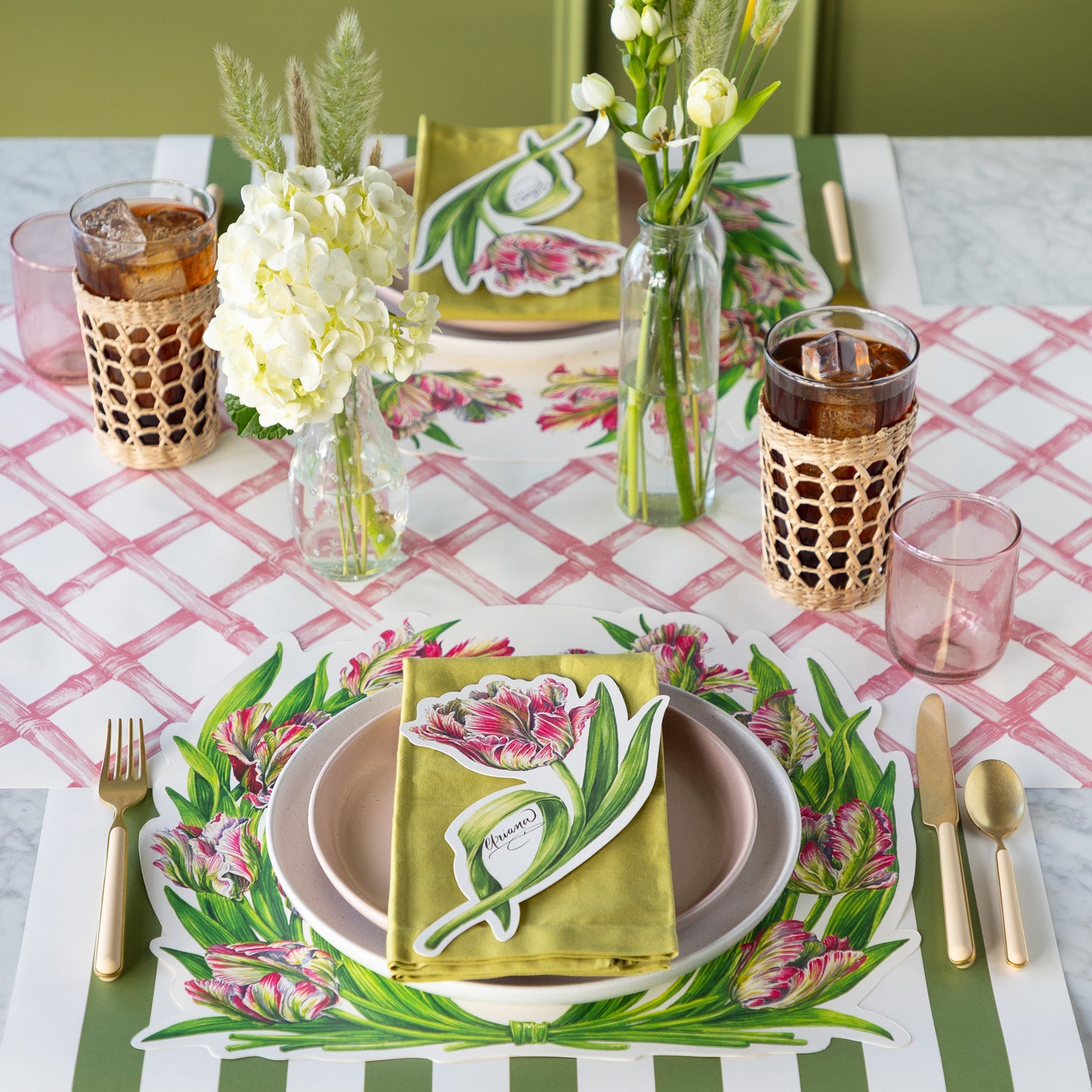 Table set with flowers, Die-cut Parrot Tulip Placemats, Parrot Tulip Table Accents, pink and white plates and vintage flatware on the Pink Lattice Runner.
