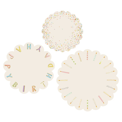 A group of Happy Birthday Serving Papers by Hester &amp; Cook, round white paper plates with text, perfect for serving papers or creating charcuterie spreads.