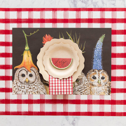 Owls on a Hester &amp; Cook red checkered placemat.