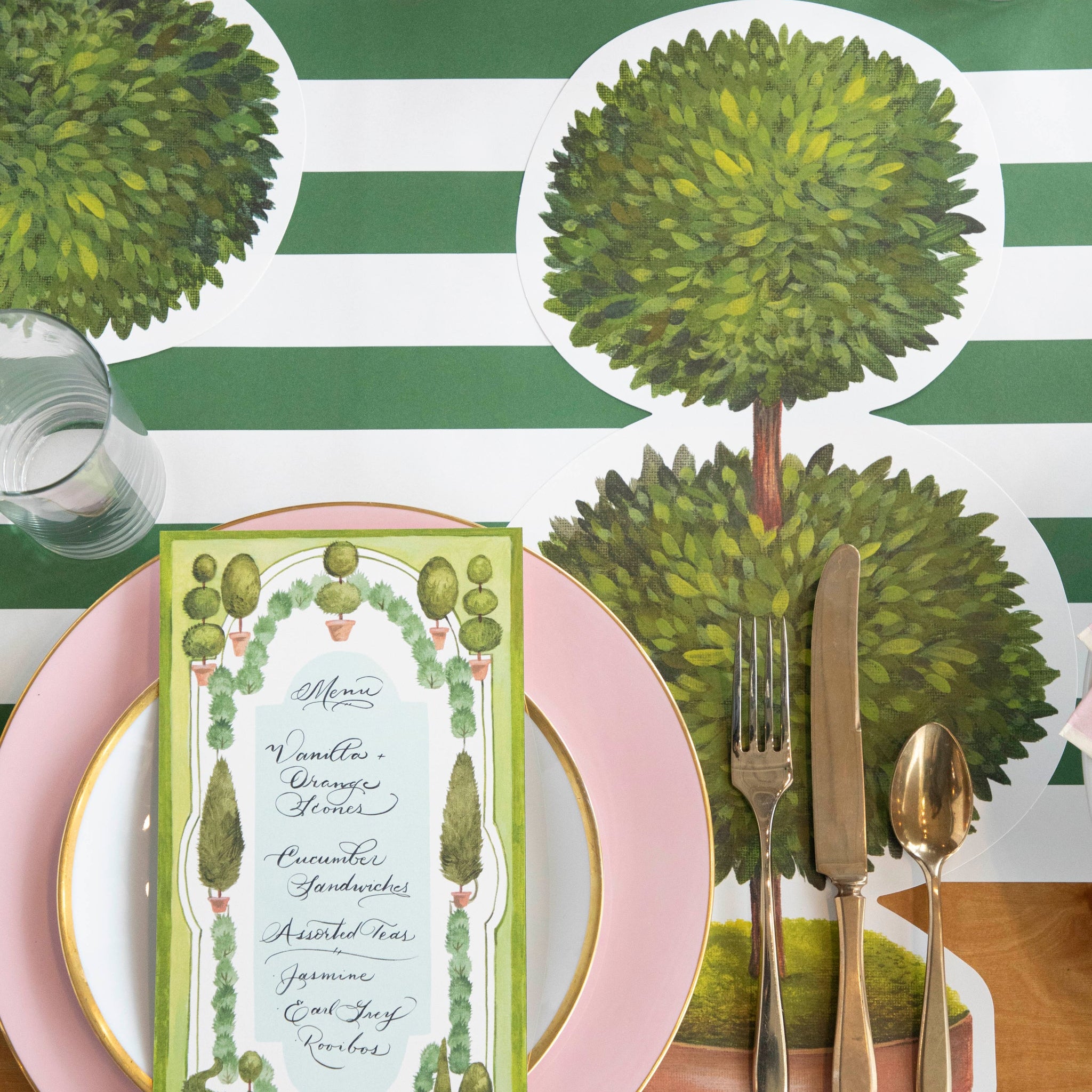 Dark Green Classic Stripe Runner under a topiary place setting.