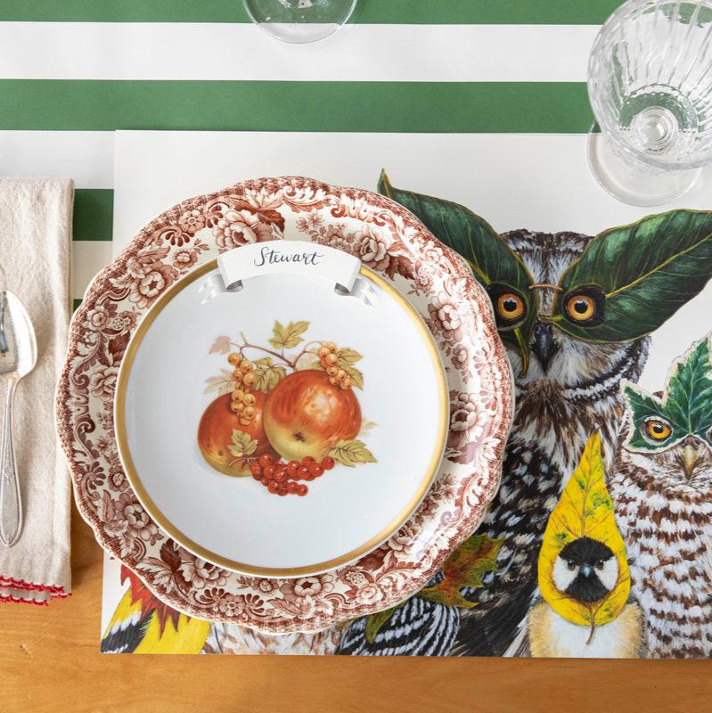 The Fall Masquerade Placemat under an elegant fall place setting, from above.