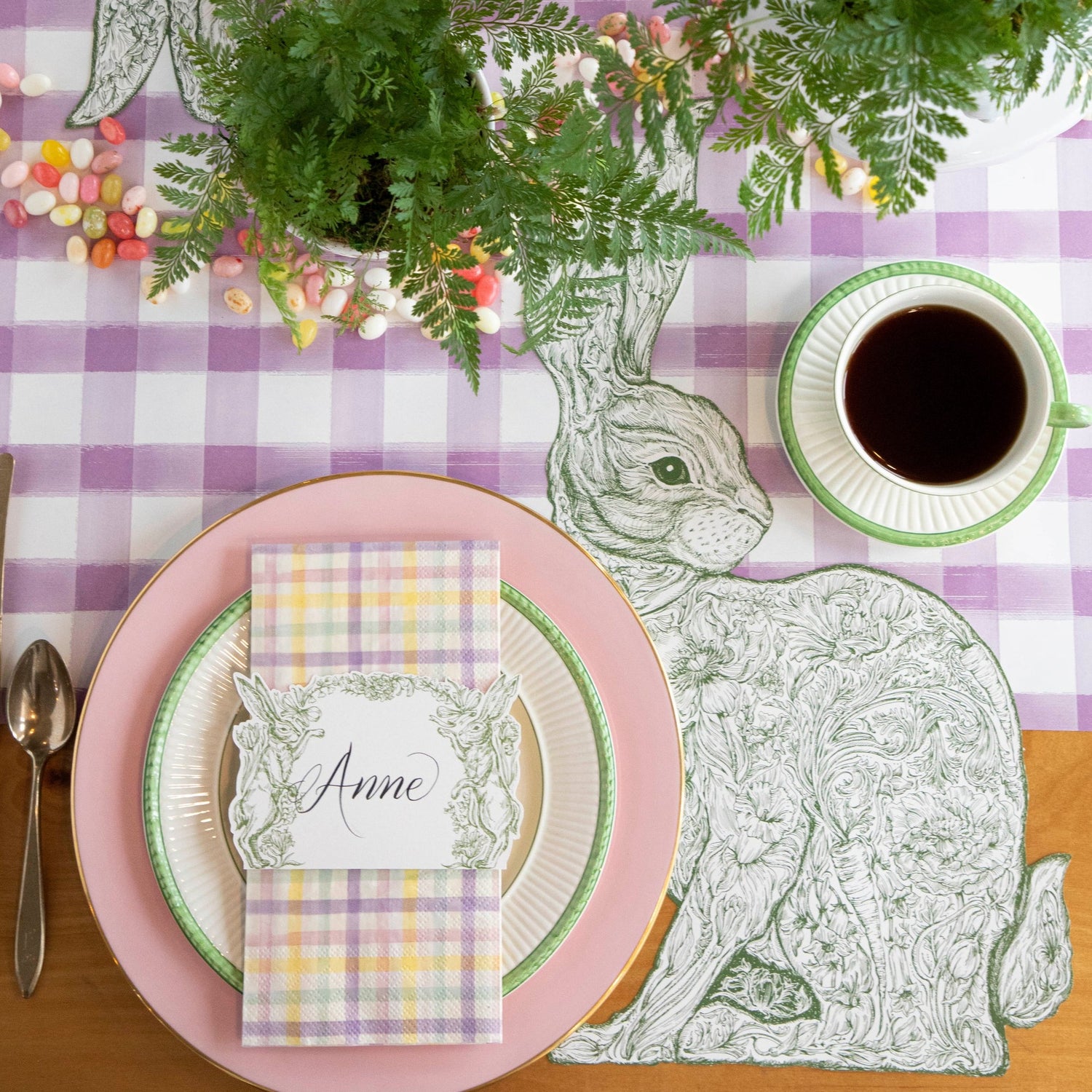The Die-cut Greenhouse Hare Placemat under an elegant Easter place setting, from above.