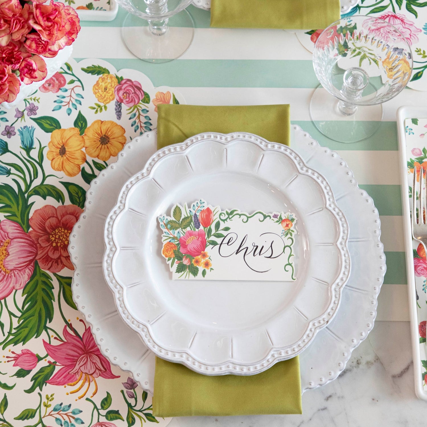A colorful floral pattern on Hester &amp; Cook Die-cut Sweet Garden Posey Placemats.