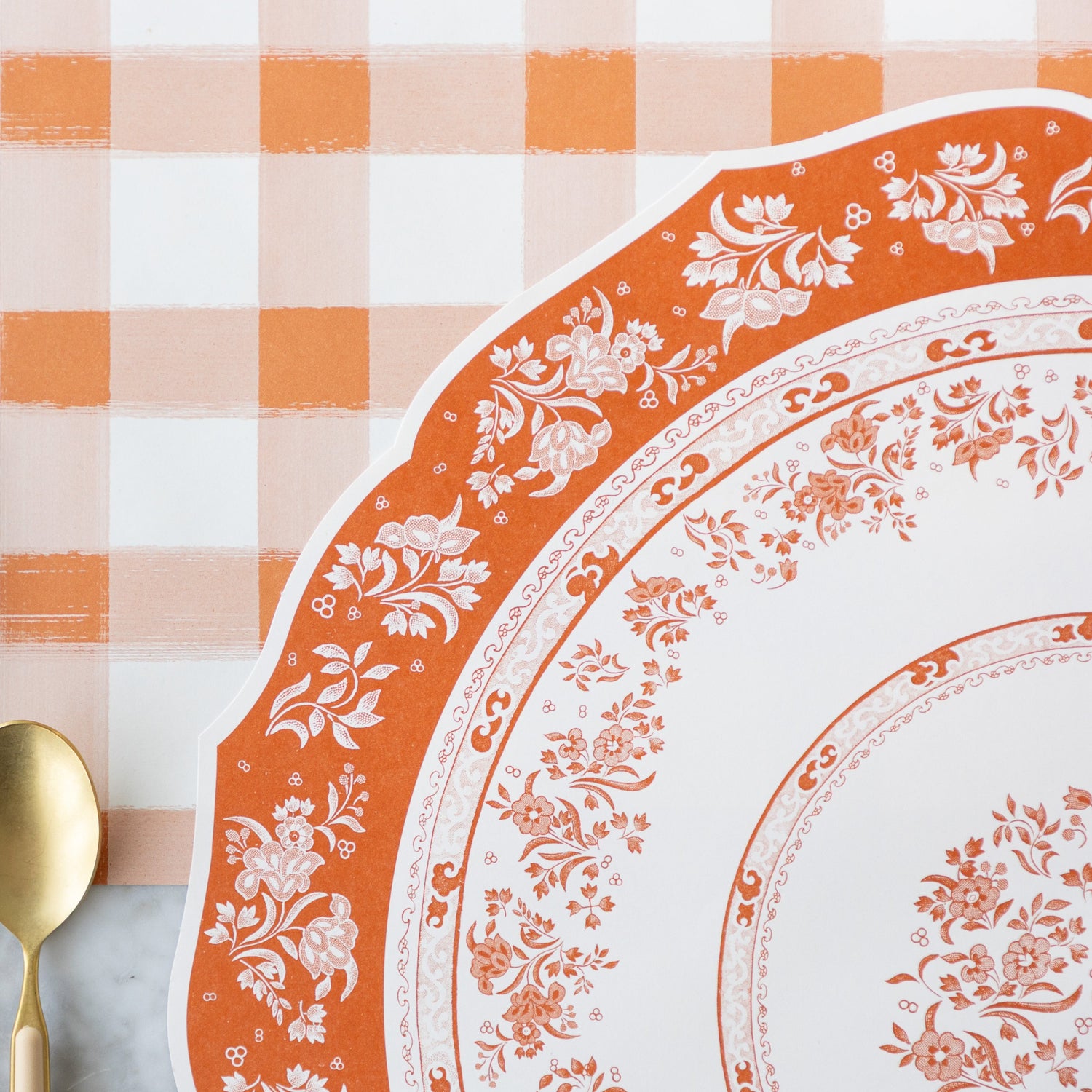 The Die-cut Pumpkin Regal Placemat on the Orange Painted Check Runner.