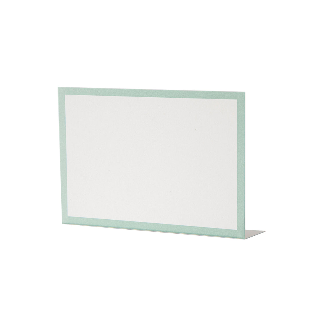 A freestanding, rectangular white table card with a simple seafoam frame around the edges.