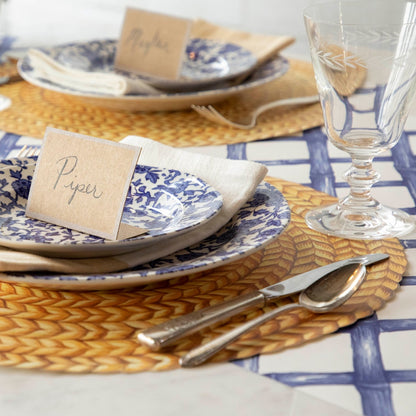 A blue and white place setting with a Hester &amp; Cook Blue Lattice Runner.