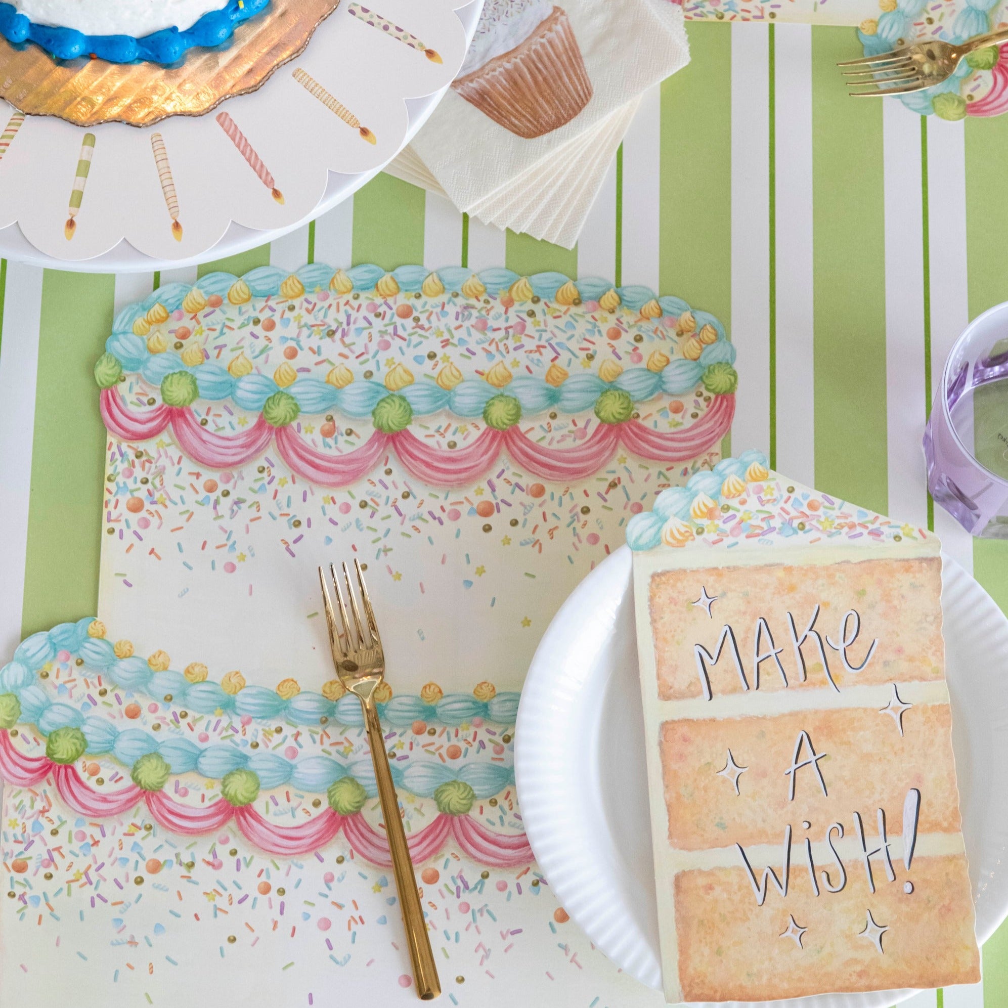 The Die-cut Birthday Cake Placemat under a birthday place setting, from above.