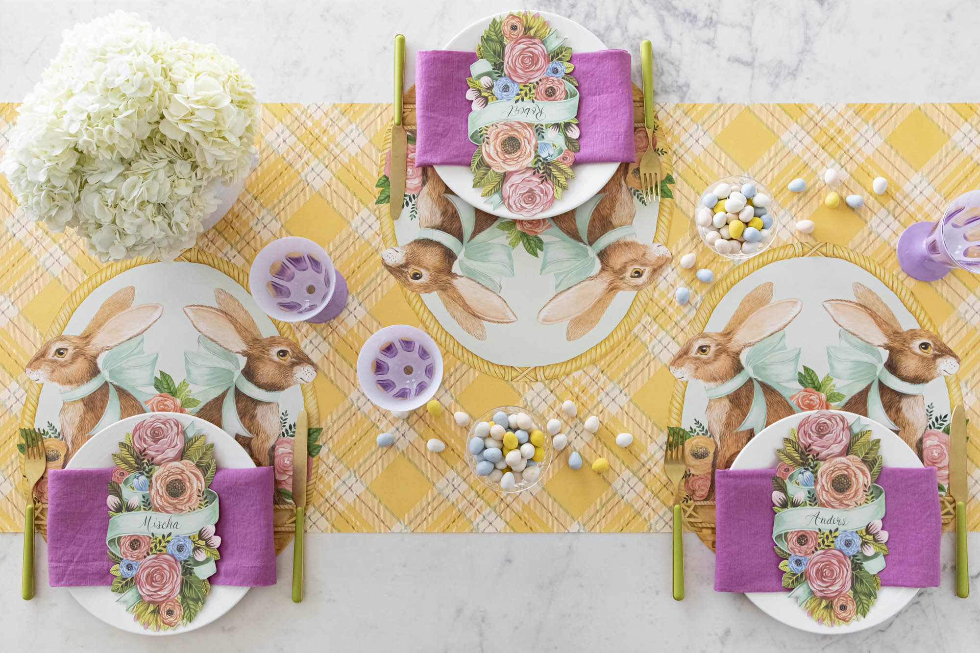 Die-cut Bunny Basket Placemat styled on an Easter table setting for three.