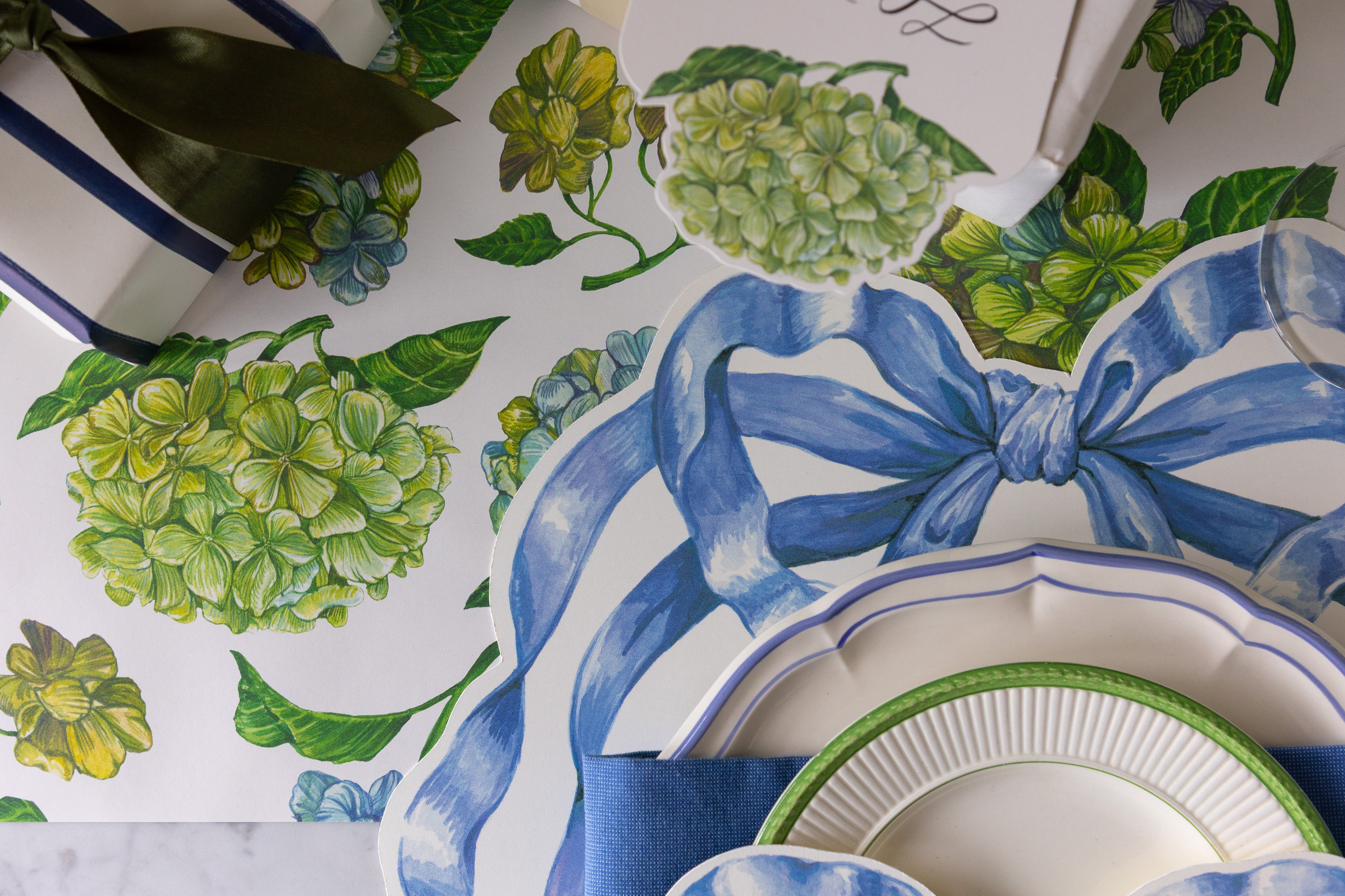 Table setting with the Die-cut Heirloom Blue Bow Placemat on the Hydrangea Runner.