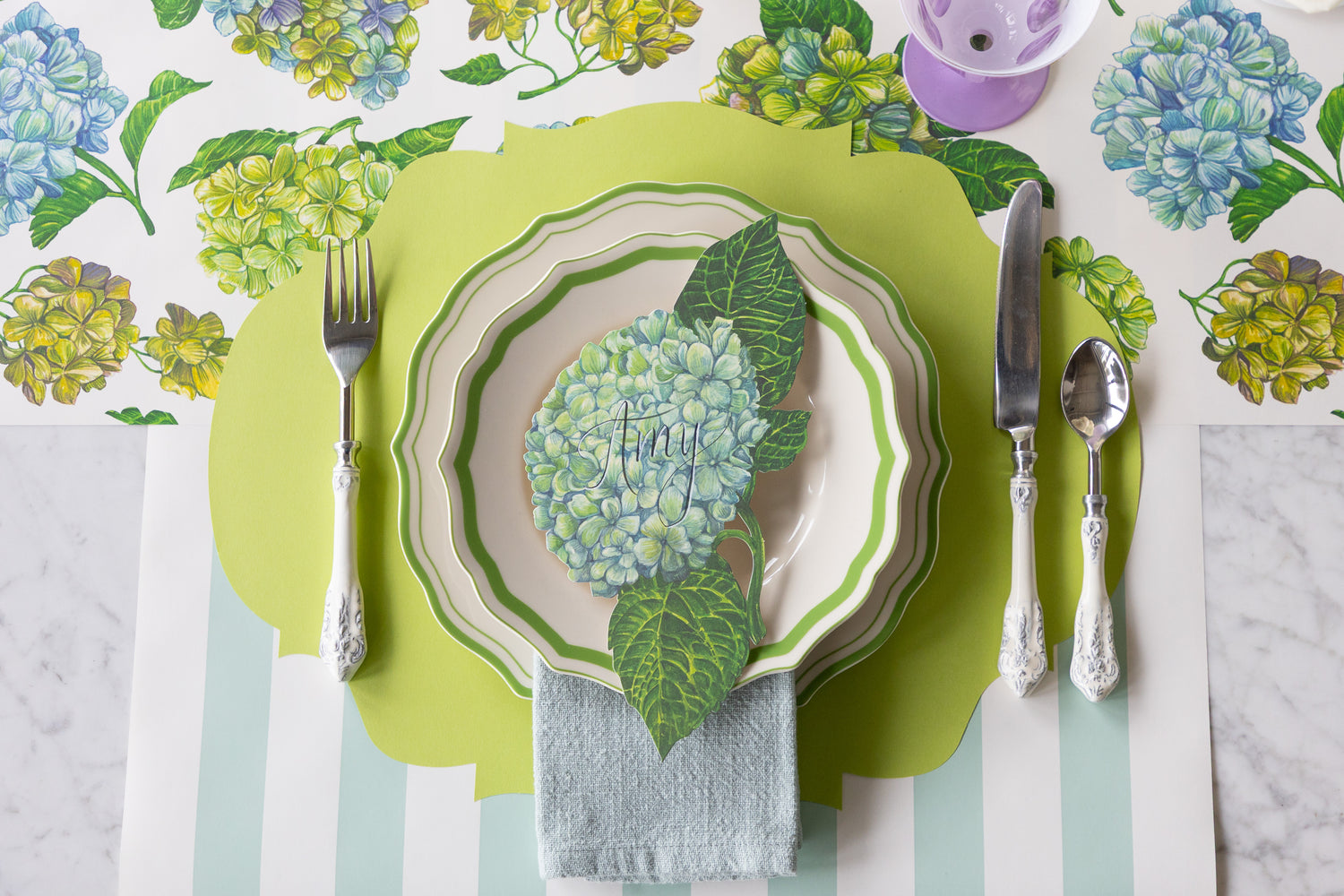 Decorative table setting with Hydrangea Runner, Die-cut Bright Green French Frame Placemat, Hydrangea Table Accent, Green Icing on the Cake Plates and Seafoam Classic Stripe Runner.