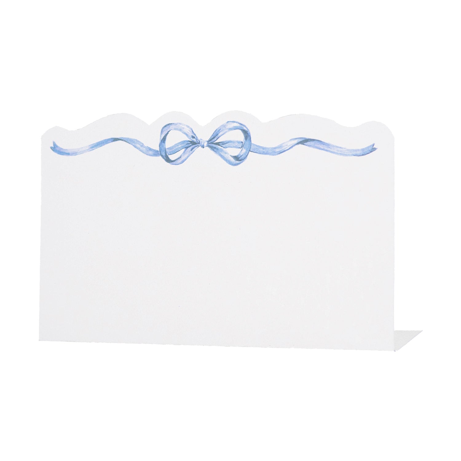 A place card with a scalloped edge and blue bow with long ribbons across the top and a blank space for writing, on a white background.