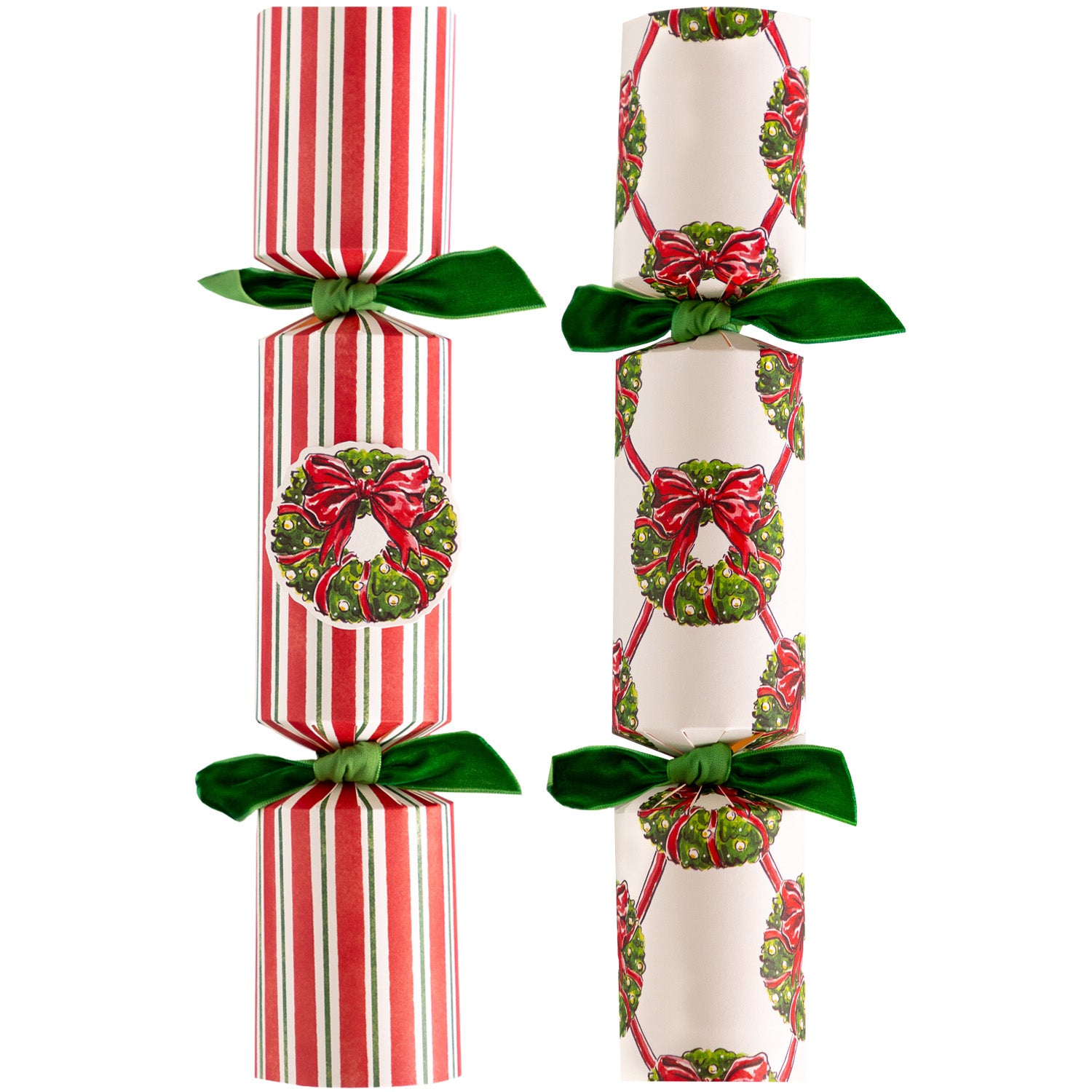 Two Holiday Wreath Crackers––one with vertical, thick red stripes and thin green stripes and a holiday wreath accent; the other with a holiday wreath lattice pattern––both tied with green velvet ribbons.