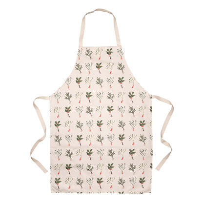 A linen apron patterned with illustrated tiny people holding gigantic winter botanicals by the stems, in green and red. 