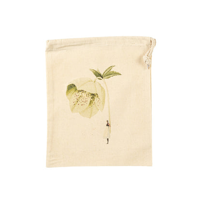 The Small Hellebore Laura Stoddard Drawstring Bag, featuring an illustration of a small woman holding a gigantic green bloom by the stem. 