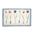 A Hester & Cook Tulip Parade Tea Towel with tulips on it.