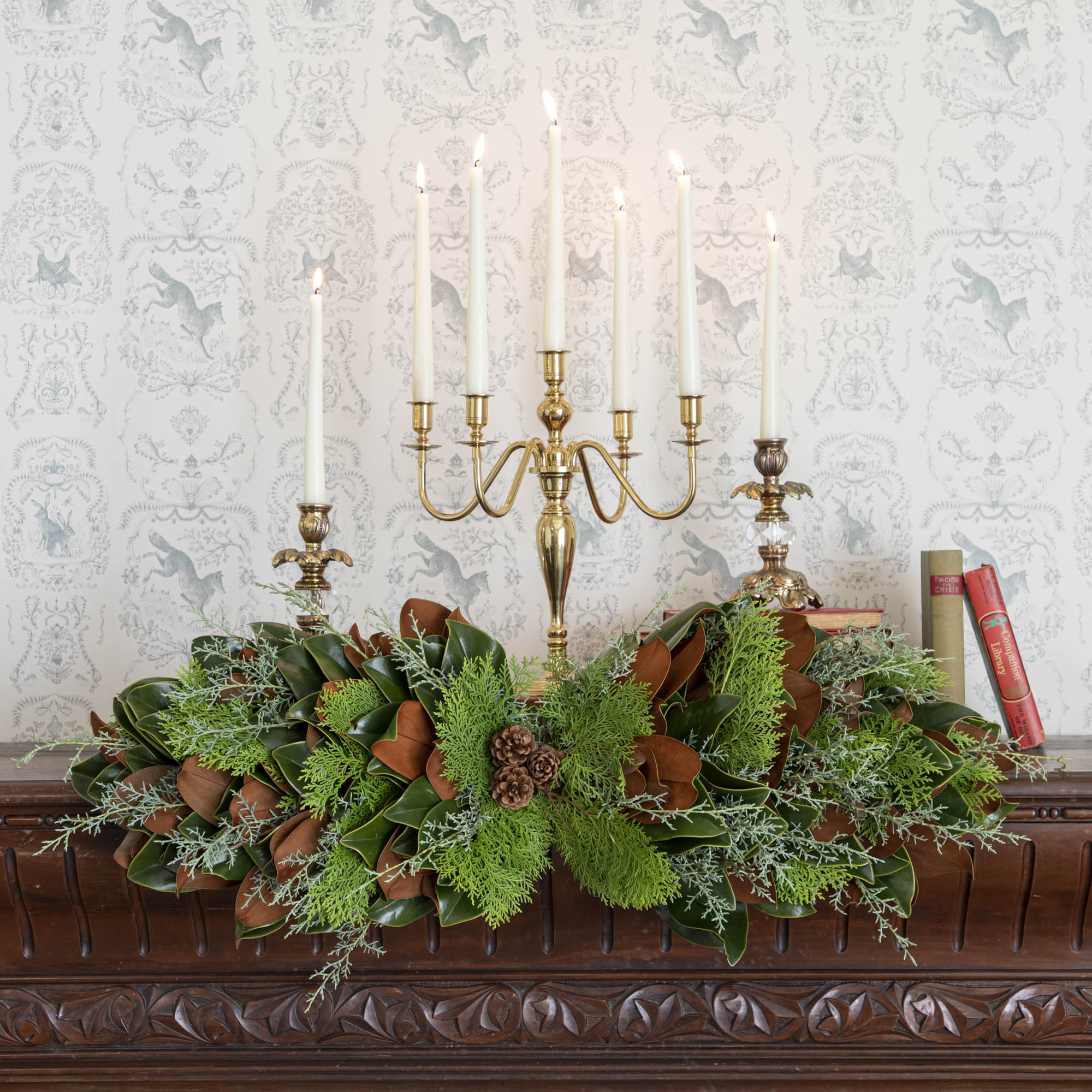 fresh bunches centerpiece styled on a mantle with candles 