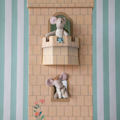 Stuffed toy mouse characters, including the Royal Twins in plush dotted vests from Maileg, displayed in small wall-mounted nooks against a striped wall with decorative tile.