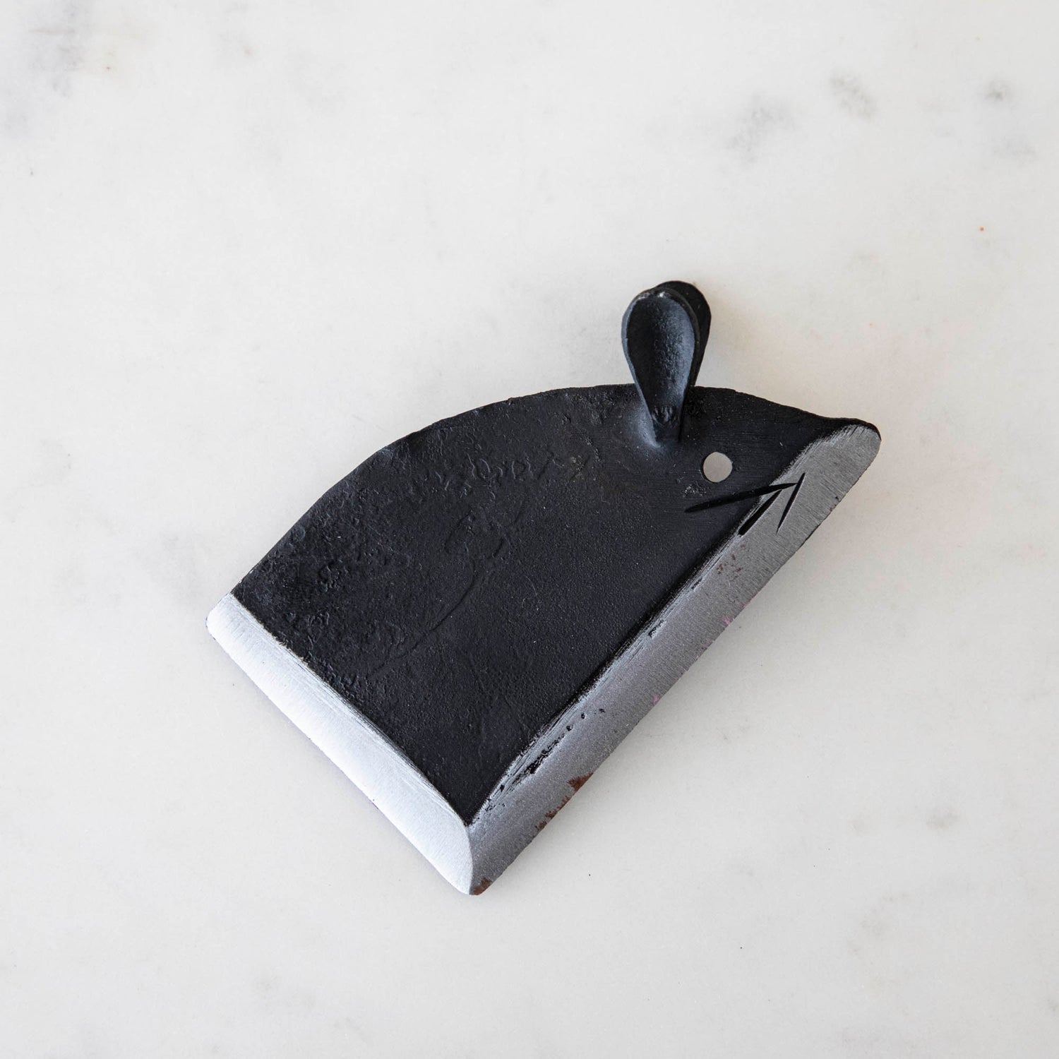 Cheese knife shaped like a mouse. 