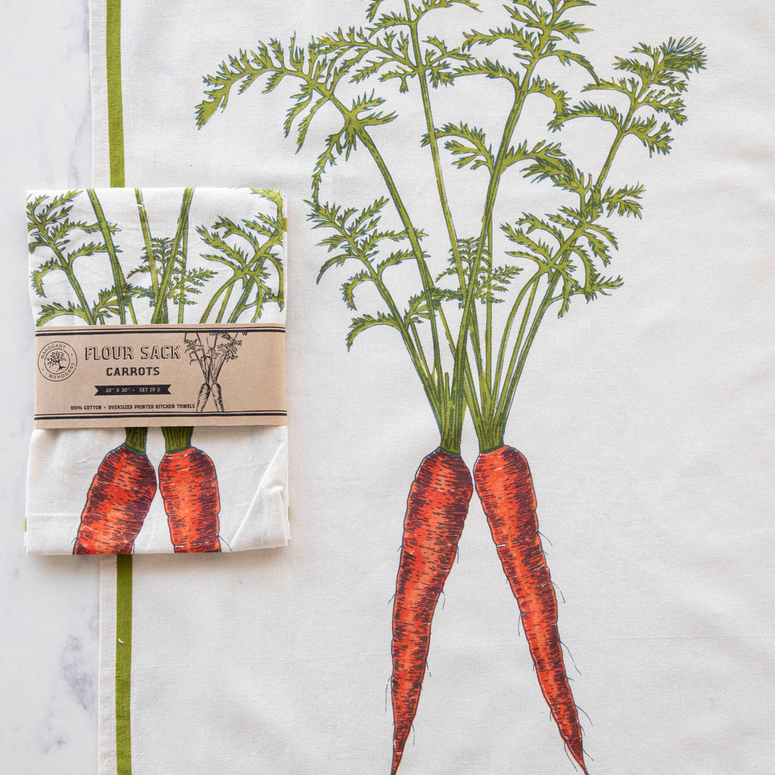 Illustration of two carrots with green tops on a Mahogany Carrot Flour Sack Kitchen Towel Set of 2 set on a white background with a green border.